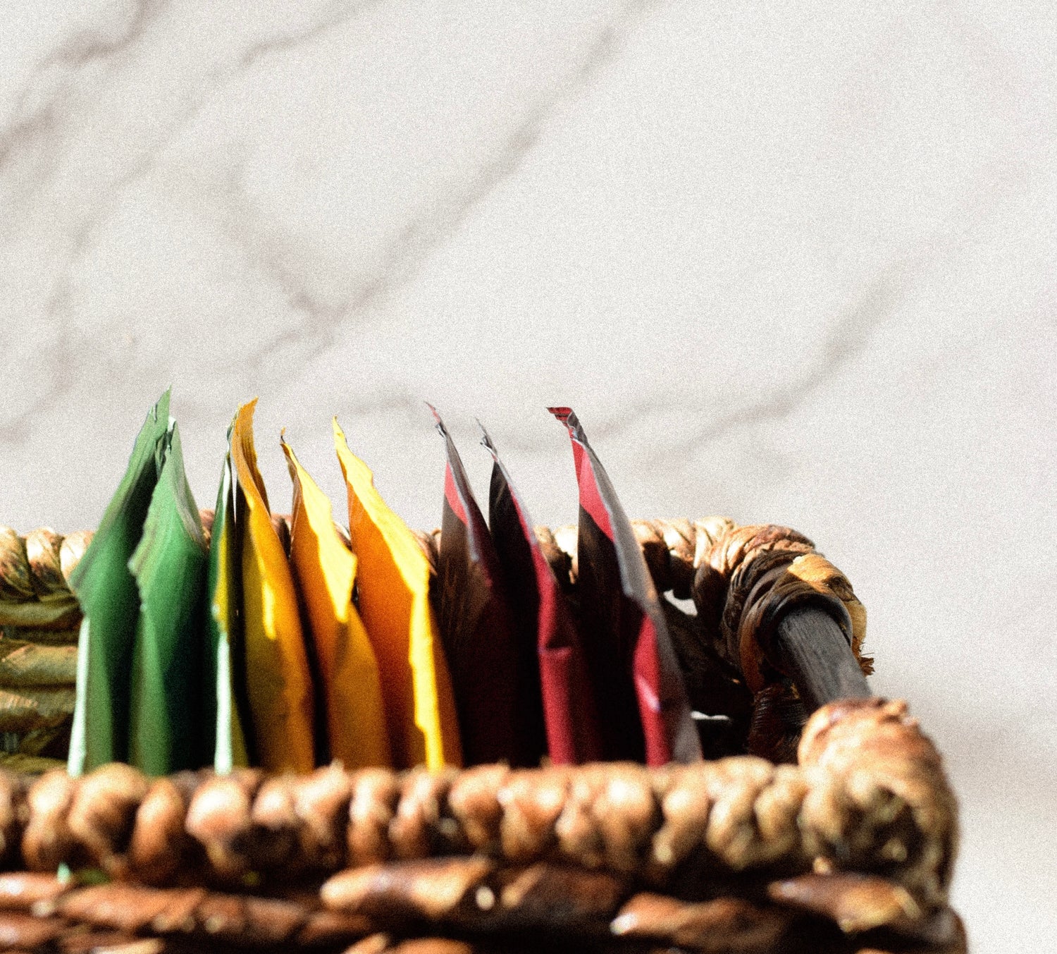 A basket filled with Malu single serve specialty pour over coffee pouches