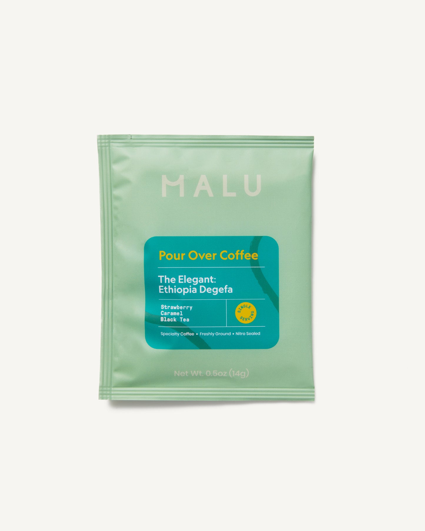 Aqua-colored packet of Malu single serve specialty pour over coffee, labeled The Elegant