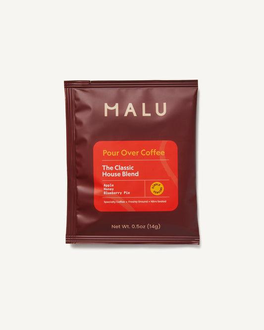 Brown-colored packet of Malu single serve specialty pour over coffee, labeled The Classic
